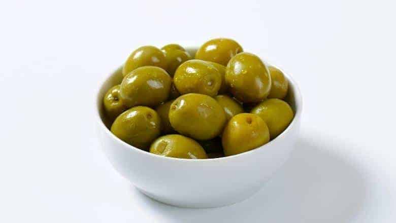 a cup of brined olives