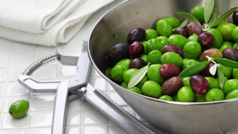 olives in a bowl ready to be pitted
